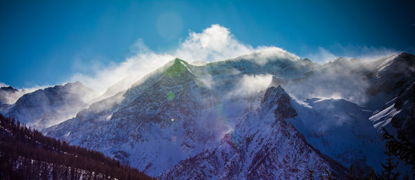 Low angle view of snow covered mountain