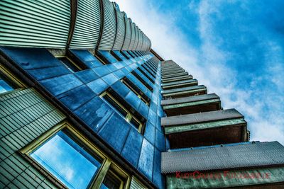 Low angle view of modern building against sky