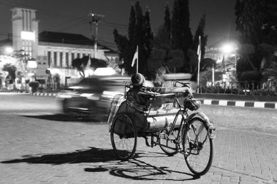 Bicycle on city street at night