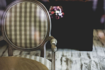 Close-up of empty chair on floor