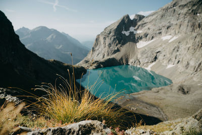 Scenic view of mountain lake against sky