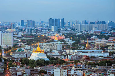 High angle view of buildings against sky in city