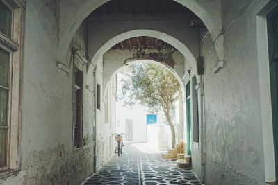 Rear view of woman walking in corridor