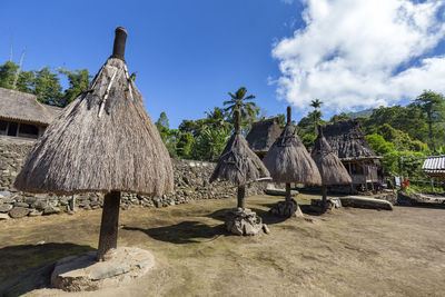 Panoramic shot of building and trees against sky