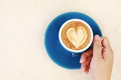 High angle view of coffee cup on table