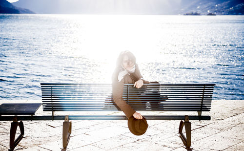 Woman sitting on beach