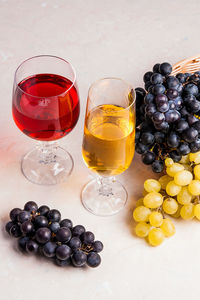 Various fruits in glass on table