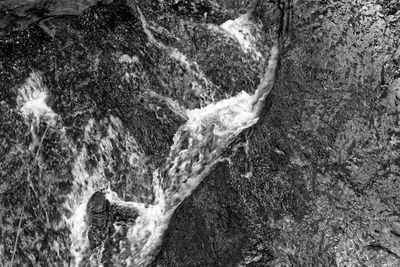 Full frame shot of waterfall in forest