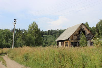 House on field against sky