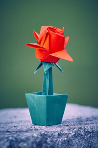 Close-up of red umbrella on table