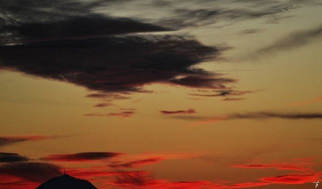 sky, cloud - sky, cloudy, sunset, beauty in nature, scenics, weather, nature, orange color, tranquility, dramatic sky, tranquil scene, cloud, red, low angle view, overcast, idyllic, cloudscape, outdoors, dusk