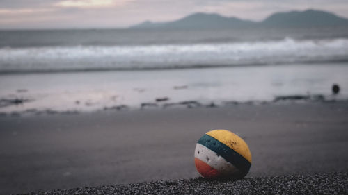 Close-up of ball on beach