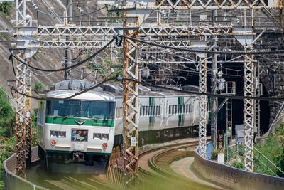 Train on railroad tracks in city