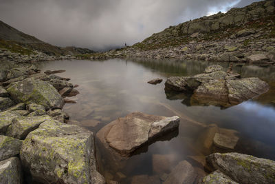 Scenic view of lake against sky in retezat mountains 