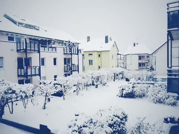 Snow covered houses in winter