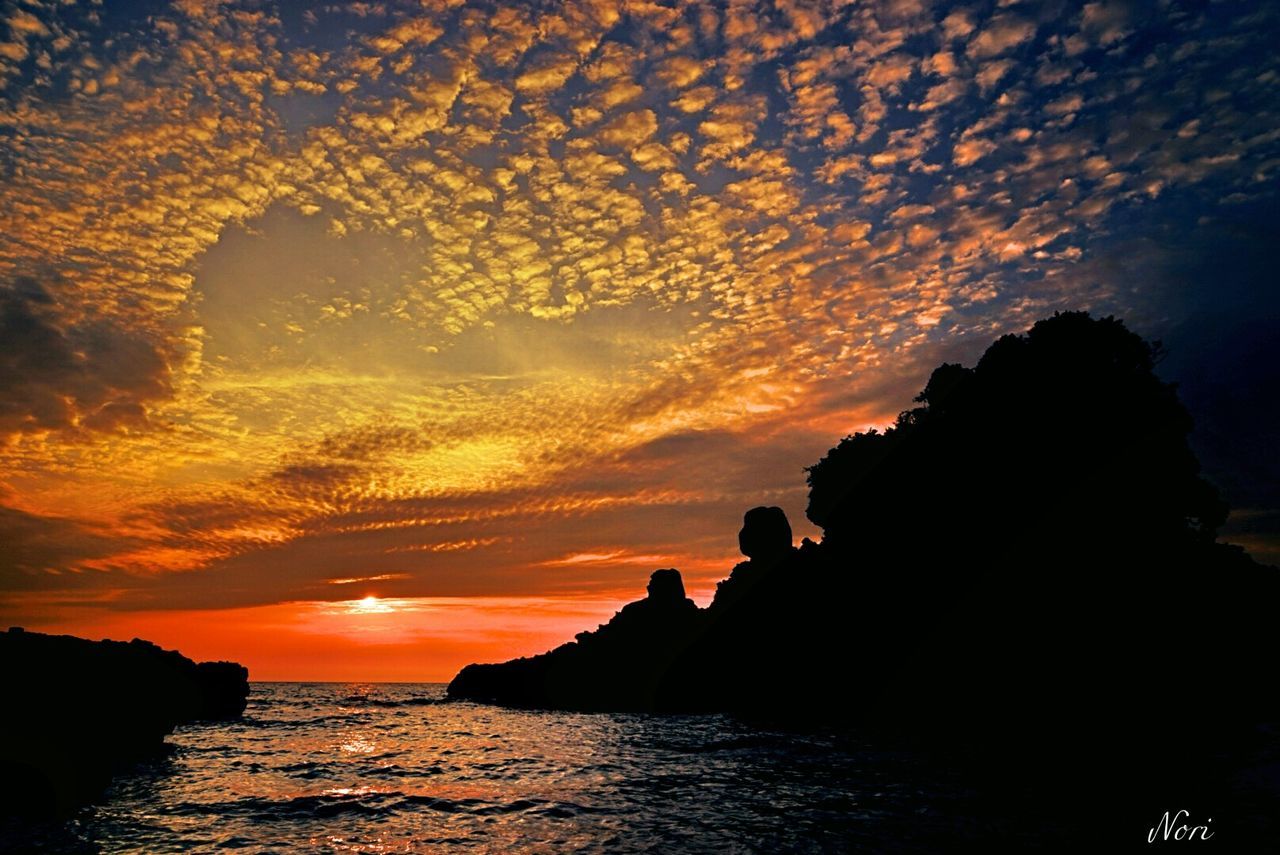 sunset, water, sea, silhouette, scenics, beauty in nature, sky, tranquil scene, tranquility, waterfront, orange color, idyllic, nature, horizon over water, rock formation, rock - object, cloud - sky, cloud, cliff, sun