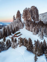 Scenic view of snow covered mountains against sky