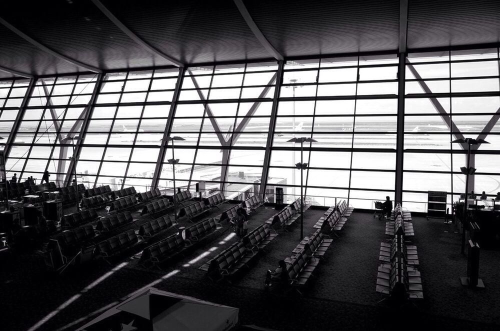 indoors, glass - material, window, transparent, built structure, architecture, transportation, modern, silhouette, sky, railroad station, city, pattern, glass, airport, ceiling, railroad station platform, day, public transportation, incidental people