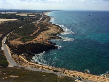 Scenic view of coastline against sky