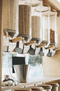 Varieties of lentils in food dispensers at shop