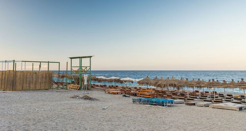 Scenic view of beach against clear sky