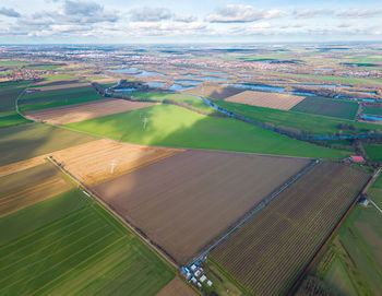 Aerial view of cityscape against sky