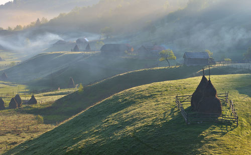 Panoramic view of land and mountains against sky