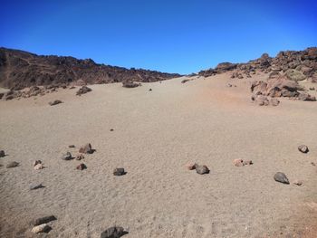 Scenic view of desert against clear sky