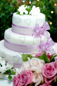 Close-up of pink roses on table