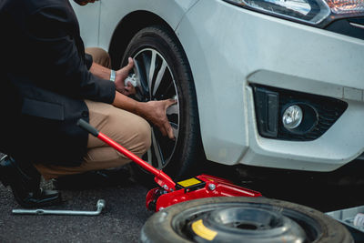 Man working in car