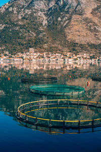 Scenic view of river with mountain in background