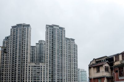 Low angle view of buildings against sky