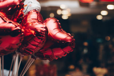 Close-up of foil helium balloons for sale at market