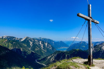 Scenic view of mountains against clear blue sky