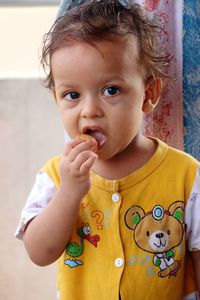 Close-up of cute girl looking away