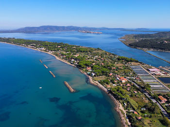 Aerial view of the argentario coast, in the background the orbetello lagoon.