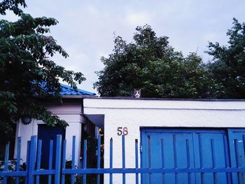 Low angle view of built structure against blue sky