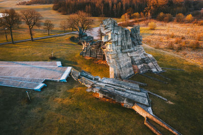 Aerial view of wooden structure on field during autumn