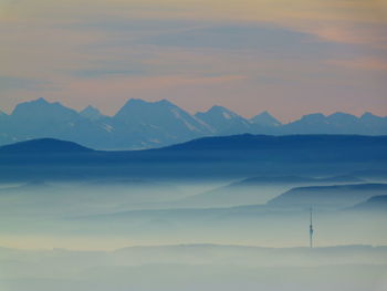 Scenic view of mountains against sky during sunset