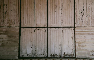 Full frame shot of weathered wooden door