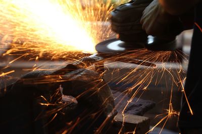 Close-up of man working in factory