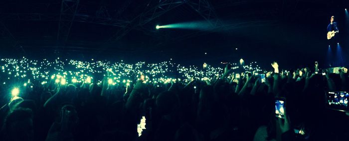 People enjoying at concert