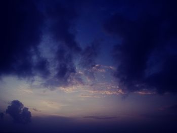 Low angle view of dramatic sky at sunset