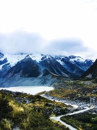 Scenic view of snowcapped mountains against sky