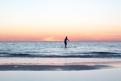 Scenic view of sea at sunset