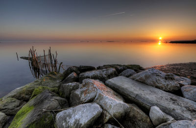 Scenic view of sea against sky during sunset