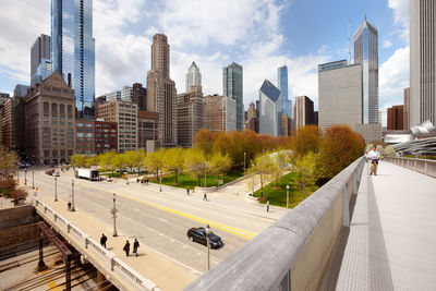 Buildings in city against sky