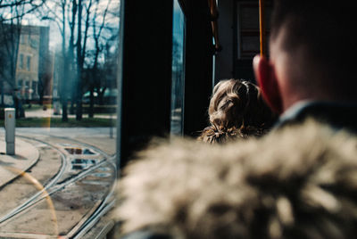 People on train in city