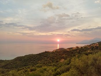 Scenic view of sea against sky during sunset