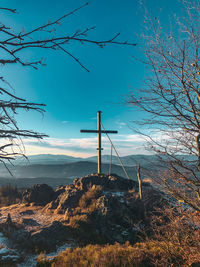 Scenic view of landscape against blue sky